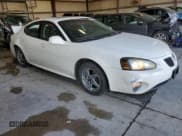 ✅ 2004 Pontiac Grand Prix GT2 • VIN: 2G2WS522741119985 • Lot: 86893245. Listed on Copart with 216,080 mi. Free auction sales archive from the USA and detailed vehicle history report at DreamBid. Image 4.