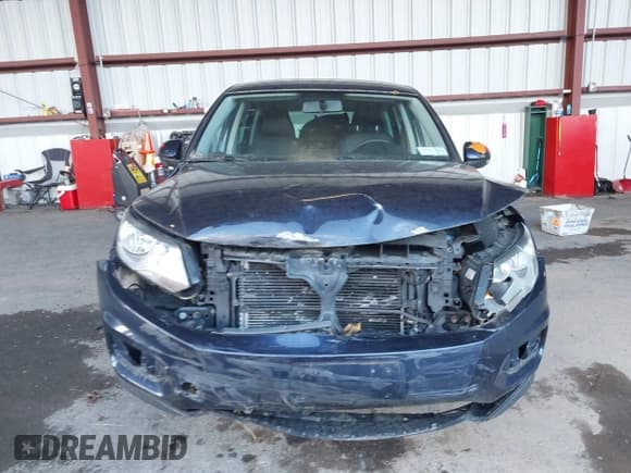 ✅ 2012 Volkswagen Tiguan S • VIN: WVGAV7AX9CW574099 • Lot: 43516447. Listed on IAAI with 154,598 mi. Free auction sales archive from the USA and detailed vehicle history report at DreamBid. Image 6.