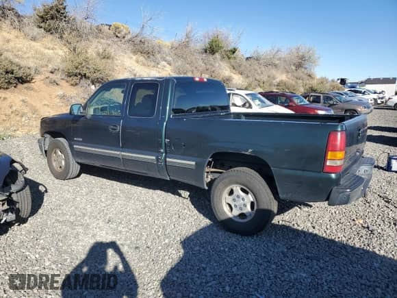 2001 Chevrolet Silverado 1500 LS z VIN 1GCEK19T01E259501, wystawiony jako Copart lot #85784615 z przebiegiem 332 511 mil mil oraz Czysty tytuł • Clean title. Historia ofert i sprzedaży dostępna na DreamBid. Obrazek 2.