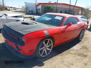 ✅ 2014 Dodge Challenger R/T 100th Anniversary Appearance • VIN: 2C3CDYBT9EH281780 • Lot: 41233362. Wystawiony na IAAI z przebiegiem 130 293 mil. Bezpłatny archiwum sprzedaży aukcyjnych z USA i szczegółowy raport historii pojazdu na DreamBid. Zdjęcie 2.