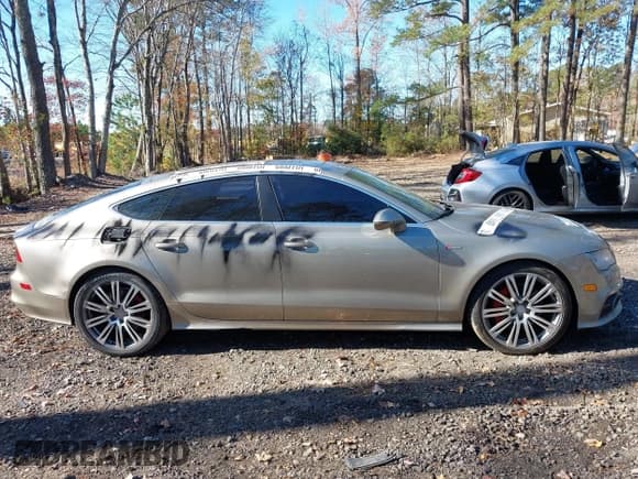 ✅ 2012 Audi A7 • VIN: WAU3GBFC8CN071019 • Lot: 43679398. Listed on IAAI with 166,451 mi. Free auction sales archive from the USA and detailed vehicle history report at DreamBid. Image 13.