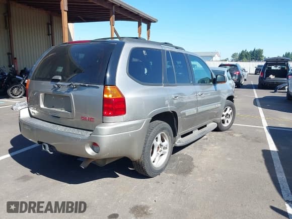 ✅ 2002 GMC Envoy SLT • VIN: 1GKDT13S722314641 • Lot: 42923683. Listed on IAAI with 141,107 mi. Free auction sales archive from the USA and detailed vehicle history report at DreamBid. Image 4.