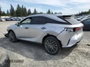 ✅ 2024 Lexus RX 450h+ Luxury • VIN: JTJCJMGA9R2010329 • Лот: 48578425. Опубликован ранее на Copart с пробегом 12 275 миль. Бесплатный доступ к архиву аукционных продаж из США и подробный отчёт об истории автомобиля на DreamBid. Изображение 2.