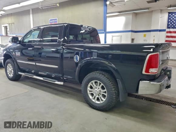 ✅ 2013 Ram 3500 Laramie • VIN: 3C63R3EL0DG518528 • Lot: 95169775. Listed on Copart with 99,547 mi. Free auction sales archive from the USA and detailed vehicle history report at DreamBid. Image 2.