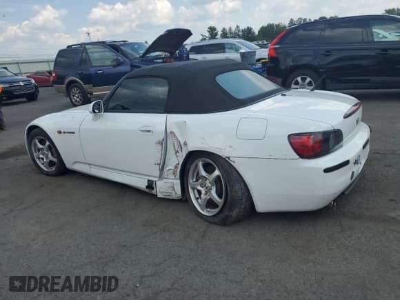 ✅ 2000 Honda S2000 • VIN: JHMAP1145YT006943 • Lot: 64041525. Listed on Copart with 59,281 mi. Free auction sales archive from the USA and detailed vehicle history report at DreamBid. Image 2.