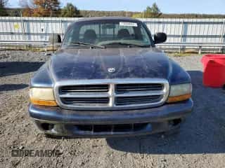 2000 Dodge Dakota Sport z VIN 1B7GG26N6YS599527, wystawiony jako Copart lot #73604624 z przebiegiem 102 127 mil mil oraz Czysty tytuł • Clean title. Historia ofert i sprzedaży dostępna na DreamBid. Obrazek 5.