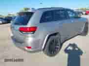 2018 Jeep Grand Cherokee Altitude z VIN 1C4RJFAG6JC220486, wystawiony jako IAAI lot #43399251 z przebiegiem 90 525 mil mil oraz . Historia ofert i sprzedaży dostępna na DreamBid. Obrazek 4.