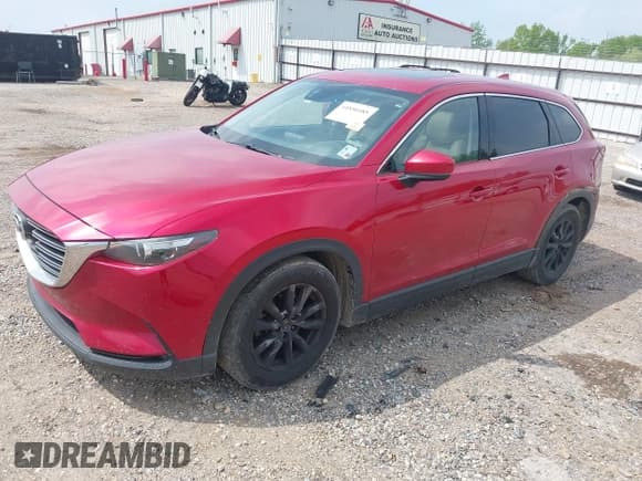 ✅ 2016 Mazda CX-9 Touring • VIN: JM3TCACY0G0101617 • Lot: 41850485. Listed on IAAI with 292,880 mi. Free auction sales archive from the USA and detailed vehicle history report at DreamBid. Image 2.