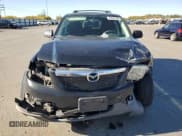 ✅ 2010 Mazda Tribute Touring • VIN: 4F2CY0C70AKM02556 • Lot: 82642245. Wystawiony na Copart z przebiegiem 140 851 mil. Bezpłatny archiwum sprzedaży aukcyjnych z USA i szczegółowy raport historii pojazdu na DreamBid. Zdjęcie 5.