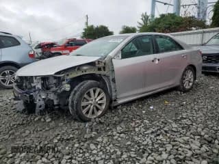 ✅ 2012 Toyota Camry XLE • VIN: 4T1BD1FK0CU024030 • Lot: 68842825. Listed on Copart with Not provided. Free auction sales archive from the USA and detailed vehicle history report at DreamBid. Image 1.