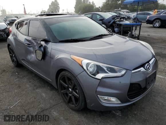 2016 Hyundai Veloster z VIN KMHTC6AD9GU260582, wystawiony jako Copart lot #71878294 z przebiegiem 83 155 mil mil oraz Szkoda całkowita • Salvage title. Historia ofert i sprzedaży dostępna na DreamBid. Obrazek 4.