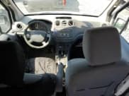 ✅ 2012 Ford Transit Connect XLT • VIN: NM0LS7DN7CT077499 • Lot: 67246035. Listed on Copart with 239,571 mi. Free auction sales archive from the USA and detailed vehicle history report at DreamBid. Image 8.