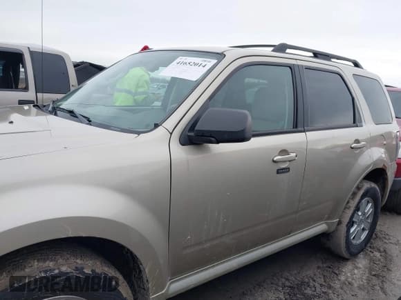 ✅ 2011 Mercury Mariner • VIN: 4M2CN8B76BKJ06851 • Lot: 41652014. Listed on IAAI with 118,914 mi. Free auction sales archive from the USA and detailed vehicle history report at DreamBid. Image 14.