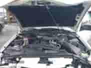 2000 Chevrolet Blazer LS z VIN 1GNCS13W8Y2126188, wystawiony jako IAAI lot #42295713 z przebiegiem 237 340 mil mil oraz . Historia ofert i sprzedaży dostępna na DreamBid. Obrazek 10.