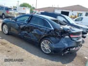 ✅ 2014 Lincoln MKZ • VIN: 3LN6L2J95ER835251 • Lot: 42870909. Wystawiony na IAAI z przebiegiem 197 023 mil. Bezpłatny archiwum sprzedaży aukcyjnych z USA i szczegółowy raport historii pojazdu na DreamBid. Zdjęcie 3.