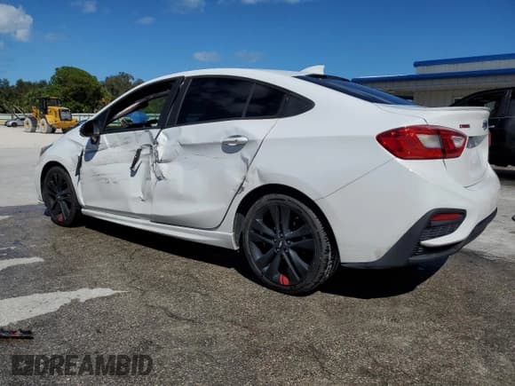 ✅ 2018 Chevrolet Cruze LT • VIN: 1G1BE5SM2J7205540 • Lot: 86994025. Listed on Copart with 122,818 mi. Free auction sales archive from the USA and detailed vehicle history report at DreamBid. Image 2.