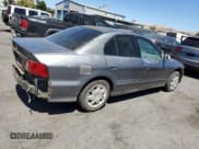 ✅ 2002 Mitsubishi Galant ES • VIN: 4A3AA46G02E097295 • Lot: 67977274. Wystawiony na Copart z przebiegiem 149 375 mil. Bezpłatny archiwum sprzedaży aukcyjnych z USA i szczegółowy raport historii pojazdu na DreamBid. Zdjęcie 3.
