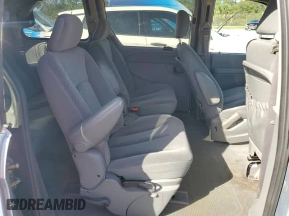 2005 Dodge Caravan SXT с VIN 1D4GP45R85B380101, выставлен на аукционе Copart как лот 77202344 с пробегом 185 107 миль миль и Списание • Salvage title. История ставок и продаж доступна на DreamBid. Изображение 11.