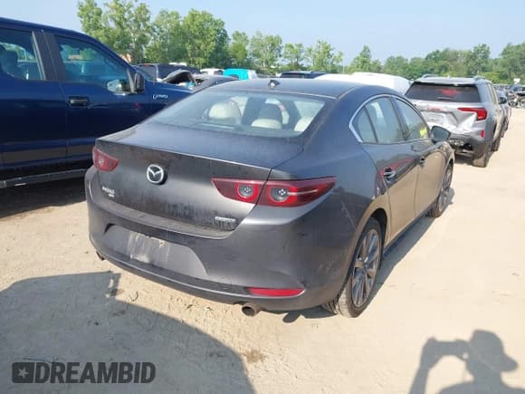 ✅ 2019 Mazda 3 Premium • VIN: JM1BPBEM6K1133340 • Lot: 42711496. Listed on IAAI with 121,674 mi. Free auction sales archive from the USA and detailed vehicle history report at DreamBid. Image 4.