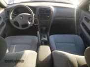 ✅ 2004 Kia Optima LX • VIN: KNAGD128745264463 • Лот: 72050484. Опубликован ранее на Copart с пробегом 60 759 миль. Бесплатный доступ к архиву аукционных продаж из США и подробный отчёт об истории автомобиля на DreamBid. Изображение 8.