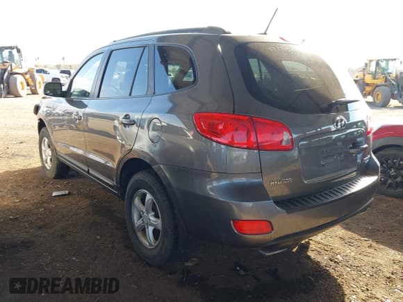 ✅ 2009 Hyundai Santa Fe GL • VIN: 5NMSG73E79H263961 • Lot: 41419880. Listed on IAAI with 165,964 mi. Free auction sales archive from the USA and detailed vehicle history report at DreamBid. Image 3.