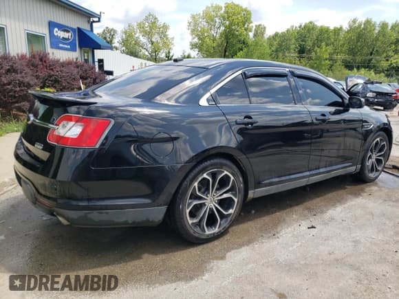 ✅ 2012 Ford Taurus SHO • VIN: 1FAHP2KT5CG100467 • Лот: 64783925. Опубликован ранее на Copart с пробегом 165 515 миль. Бесплатный доступ к архиву аукционных продаж из США и подробный отчёт об истории автомобиля на DreamBid. Изображение 3.