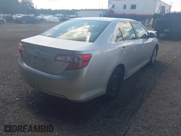 ✅ 2013 Toyota Camry LE • VIN: 4T4BF1FK1DR305982 • Lot: 43079253. Listed on IAAI with 92,098 mi. Free auction sales archive from the USA and detailed vehicle history report at DreamBid. Image 4.