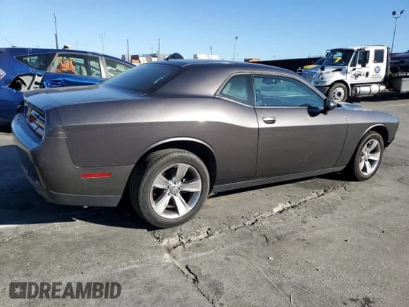 ✅ 2015 Dodge Challenger SXT • VIN: 2C3CDZAG6FH798594 • Лот: 90475265. Опубликован ранее на Copart с пробегом 107 677 миль. Бесплатный доступ к архиву аукционных продаж из США и подробный отчёт об истории автомобиля на DreamBid. Изображение 3.