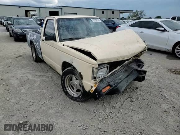 1990 Chevrolet S-10 z VIN 1GCCS14E7L2150795, wystawiony jako Copart lot #71732124 z przebiegiem 138 555 mil mil oraz Szkoda całkowita • Salvage title. Historia ofert i sprzedaży dostępna na DreamBid. Obrazek 11.
