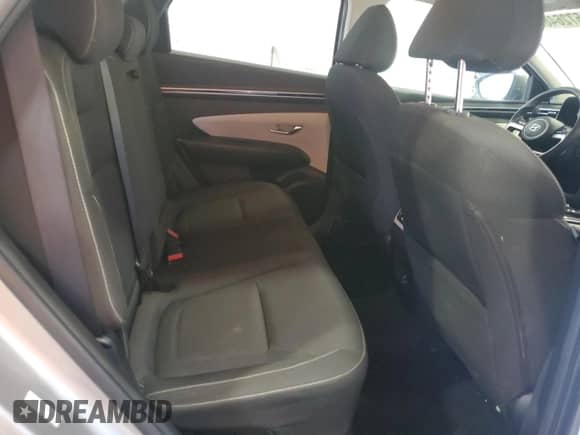 2023 Hyundai Tucson Blue z VIN KM8JBCA12PU091438, wystawiony jako Copart lot #57264655 z przebiegiem 72 768 mil mil oraz Szkoda całkowita • Salvage title. Historia ofert i sprzedaży dostępna na DreamBid. Obrazek 11.