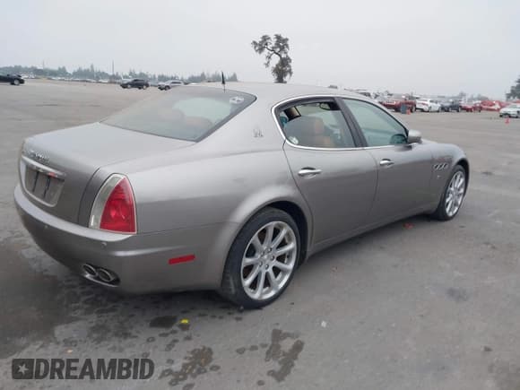 ✅ 2006 Maserati Quattroporte • VIN: ZAMCE39A760022741 • Лот: 43822327. Опубликован ранее на IAAI с пробегом 73 521 миль. Бесплатный доступ к архиву аукционных продаж из США и подробный отчёт об истории автомобиля на DreamBid. Изображение 4.