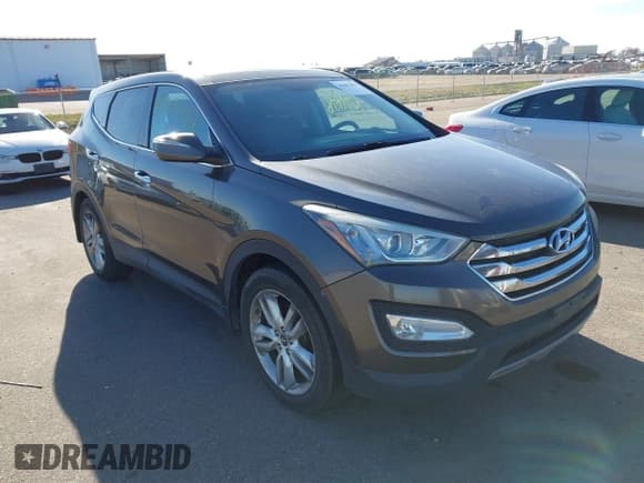 ✅ 2013 Hyundai Santa Fe Sport • VIN: 5XYZW3LA5DG040716 • Lot: 43681898. Listed on IAAI with 214,736 mi. Free auction sales archive from the USA and detailed vehicle history report at DreamBid. Image 1.