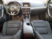 ✅ 2016 Mazda CX-5 Touring • VIN: JM3KE2CY6G0697957 • Лот: 89554065. Опубликован ранее на Copart с пробегом 237 602 миль. Бесплатный доступ к архиву аукционных продаж из США и подробный отчёт об истории автомобиля на DreamBid. Изображение 8.