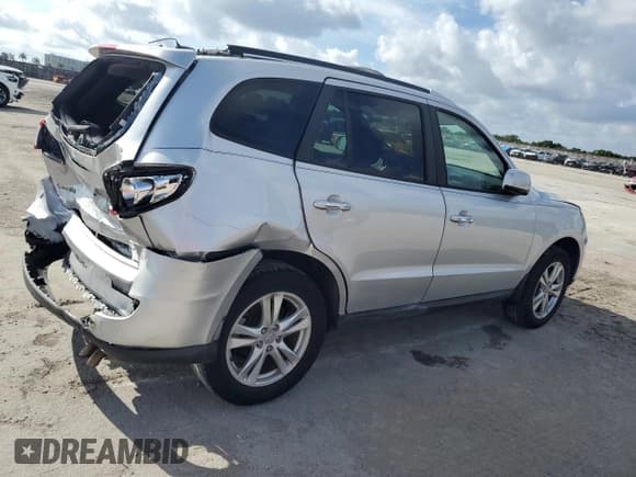 ✅ 2012 Hyundai Santa Fe Limited • VIN: 5XYZK4AG4CG164046 • Lot: 86106994. Listed on Copart with 140,418 mi. Free auction sales archive from the USA and detailed vehicle history report at DreamBid. Image 3.