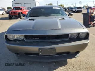 ✅ 2012 Dodge Challenger SXT • VIN: 2C3CDYAG0CH228029 • Lot: 77434704. Wystawiony na Copart z przebiegiem 133 272 mil. Bezpłatny archiwum sprzedaży aukcyjnych z USA i szczegółowy raport historii pojazdu na DreamBid. Zdjęcie 5.