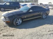 ✅ 2006 Ford Mustang GT Deluxe • VIN: 1ZVFT82H365260761 • Lot: 80966805. Wystawiony na Copart z przebiegiem 95 931 mil. Bezpłatny archiwum sprzedaży aukcyjnych z USA i szczegółowy raport historii pojazdu na DreamBid. Zdjęcie 1.