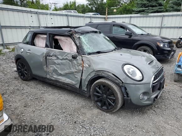 ✅ 2015 MINI Hardtop 4 Door S • VIN: WMWXU3C59F2B62606 • Lot: 58613184. Listed on Copart with 104,994 mi. Free auction sales archive from the USA and detailed vehicle history report at DreamBid. Image 4.