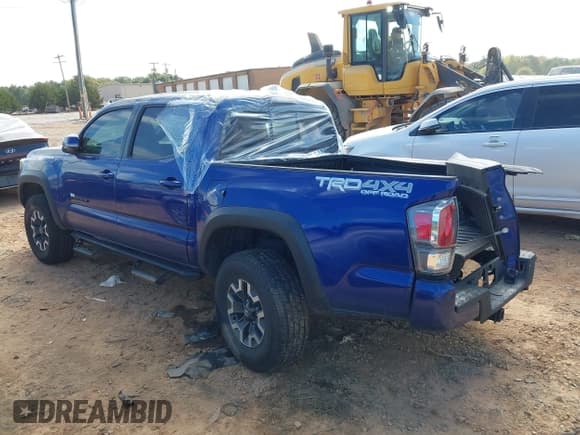 ✅ 2023 Toyota Tacoma TRD Off Road • VIN: 3TMCZ5AN2PM541357 • Lot: 43365447. Listed on IAAI with 94,759 mi. Free auction sales archive from the USA and detailed vehicle history report at DreamBid. Image 3.