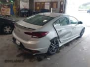 ✅ 2019 Hyundai Elantra Sport • VIN: KMHD04LB0KU887208 • Lot: 42259299. Listed on IAAI with 104,142 mi. Free auction sales archive from the USA and detailed vehicle history report at DreamBid. Image 4.