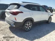 ✅ 2021 Kia Seltos S • VIN: KNDEUCA22M7097887 • Lot: 58737095. Listed on Copart with 62,702 mi. Free auction sales archive from the USA and detailed vehicle history report at DreamBid. Image 3.