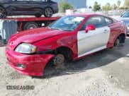 ✅ 2005 Hyundai Tiburon GS • VIN: KMHHM65D45U183100 • Лот: 43627934. Опубликован ранее на IAAI с пробегом 130 401 миль. Бесплатный доступ к архиву аукционных продаж из США и подробный отчёт об истории автомобиля на DreamBid. Изображение 2.