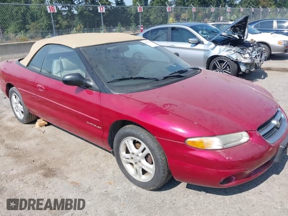 ✅ 1997 Chrysler Sebring JXi • VIN: 3C3EL55H2VT593397 • Lot: 43190045. Listed on IAAI with 131,572 mi. Free auction sales archive from the USA and detailed vehicle history report at DreamBid. Image 1.