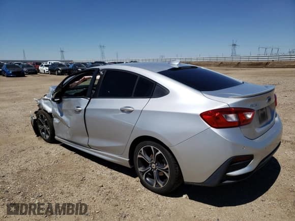 ✅ 2019 Chevrolet Cruze LT • VIN: 1G1BE5SM3K7138805 • Lot: 65439803. Listed on Copart with 76,827 mi. Free auction sales archive from the USA and detailed vehicle history report at DreamBid. Image 2.