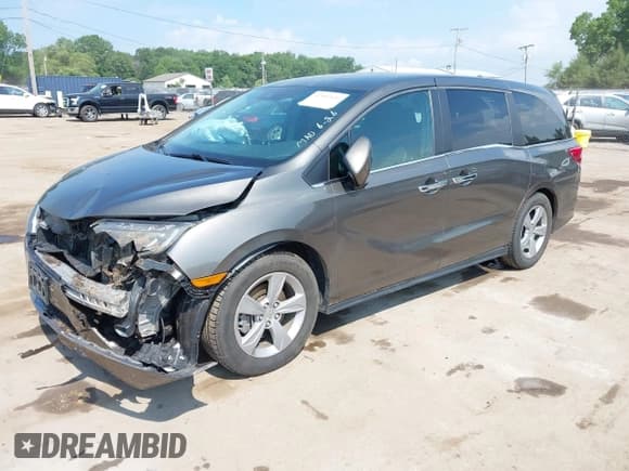 ✅ 2018 Honda Odyssey EX-L • VIN: 5FNRL6H75JB005569 • Lot: 42581626. Listed on IAAI with 91,218 mi. Free auction sales archive from the USA and detailed vehicle history report at DreamBid. Image 2.
