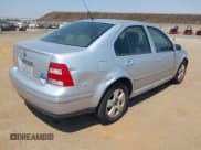 ✅ 2005 Volkswagen Jetta GLS • VIN: 3VWSA69M05M075572 • Lot: 42730682. Listed on IAAI with 159,474 mi. Free auction sales archive from the USA and detailed vehicle history report at DreamBid. Image 4.