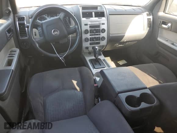 2011 Mercury Mariner z VIN 4M2CN8B77BKJ05126, wystawiony jako Copart lot #48365395 z przebiegiem 179 768 mil mil oraz Szkoda całkowita • Salvage title. Historia ofert i sprzedaży dostępna na DreamBid. Obrazek 8.