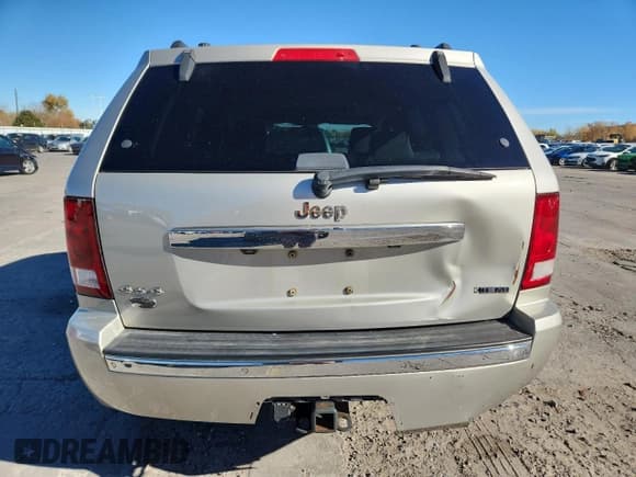 ✅ 2009 Jeep Grand Cherokee • VIN: 1J8HR68T69C520847 • Lot: 89548155. Listed on Copart with 322,340 mi. Free auction sales archive from the USA and detailed vehicle history report at DreamBid. Image 6.