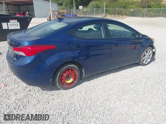 ✅ 2013 Hyundai Elantra GLS • VIN: KMHDH4AE2DU875733 • Lot: 43217340. Listed on IAAI with 165,506 mi. Free auction sales archive from the USA and detailed vehicle history report at DreamBid. Image 4.
