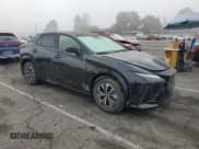 ✅ 2024 Lexus RZ 300e Premium • VIN: JTJABABB7RA003226 • Lot: 91451275. Listed on Copart with 14,511 mi. Free auction sales archive from the USA and detailed vehicle history report at DreamBid. Image 4.