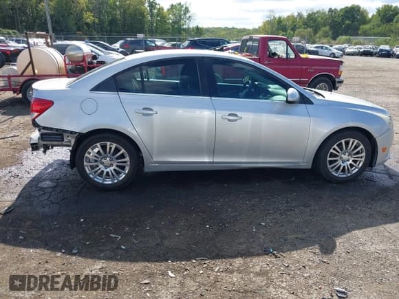 ✅ 2013 Chevrolet Cruze ECO • VIN: 1G1PH5SB6D7253414 • Лот: 43339679. Опубликован ранее на IAAI с пробегом 157 968 миль. Бесплатный доступ к архиву аукционных продаж из США и подробный отчёт об истории автомобиля на DreamBid. Изображение 14.